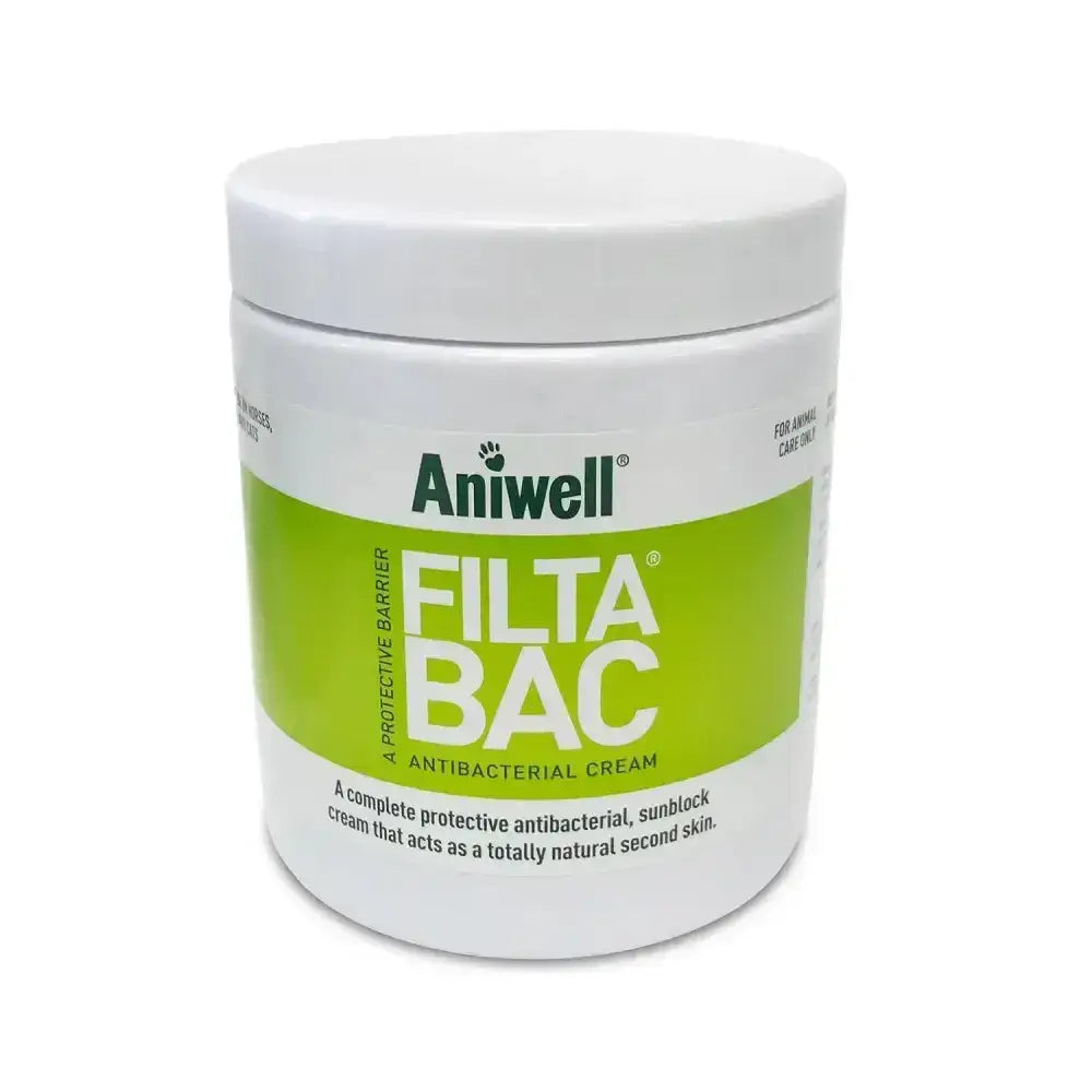 White plastic jar with lime green label of aniwell filtabac antibacterial sunblock cream for heat-lamp burn protection