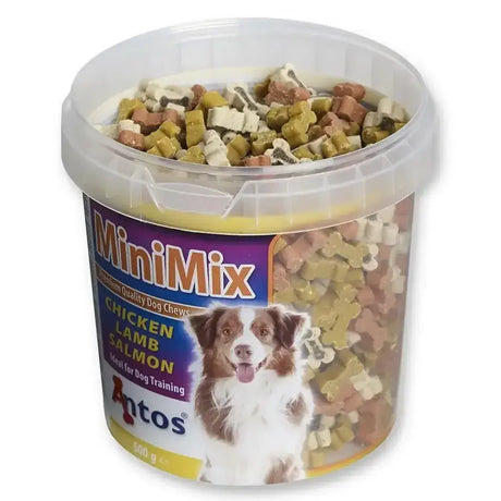 A clear plastic container of colorful bone-shaped chicken lamb salmon antos minimix premium quality dog chews
