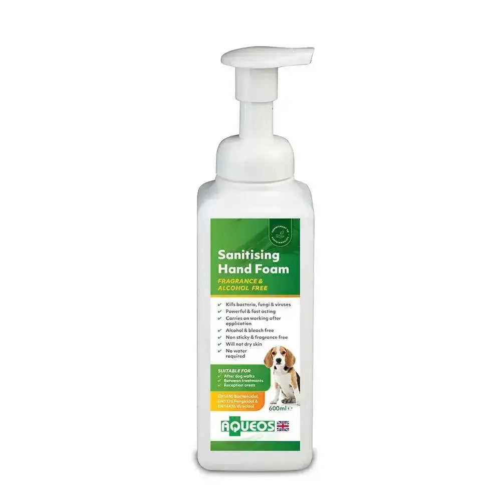 White plastic bottle of aqueos anti-bacterial canine liquid soap with green label and white pump dispenser