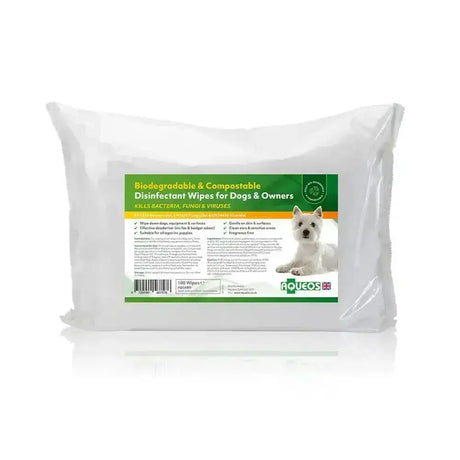 A package of aqueos disinfectant wipes with eco compostable green label and west highland white terrier for biosecurity giving dog