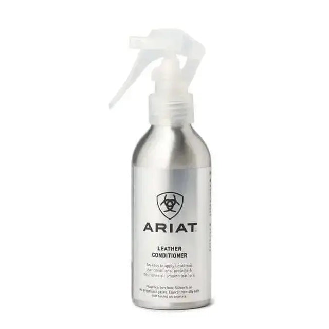 A sleek silver metallic ariat leather conditioner spray bottle with clear trigger for smooth leathers and horse tack care