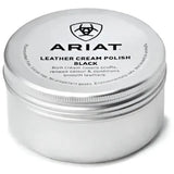 A silver cylindrical tin of ariat leather cream polish with matte finish and embossed branding that covers scuffs
