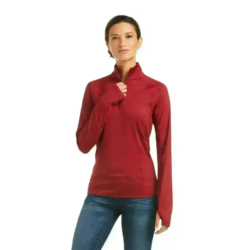 A vibrant red long-sleeved quarter zip athletic top from ariat lowell base layer 2.0 with a sleek form-fitting design