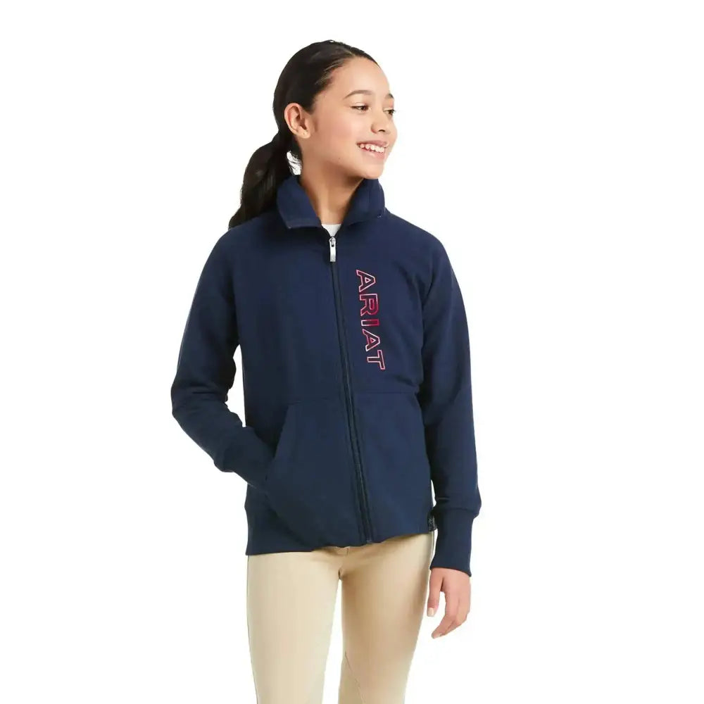 Navy blue ariat team kids zip-up hoodie with pink and white logo perfect for outdoor coats that work harder