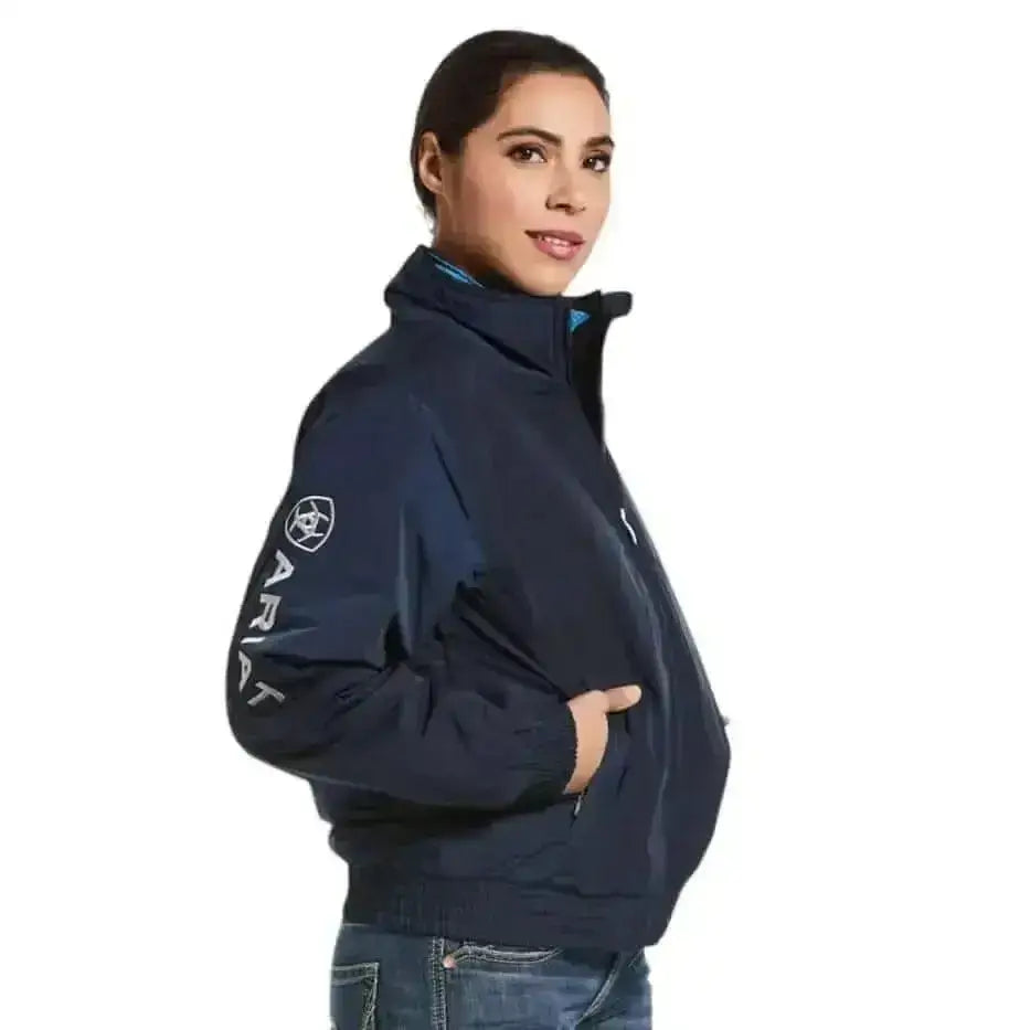 Navy blue ariat womens stable jacket with white logo on sleeve and zipper detail perfect yard coat wind resistant jacket