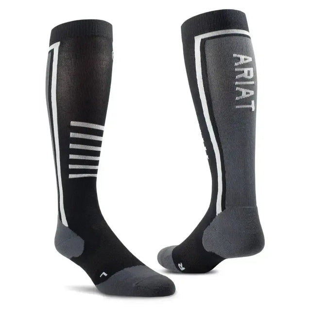Black and gray ariattek slimline performance riding socks with white stripes and ariat branding on one leg