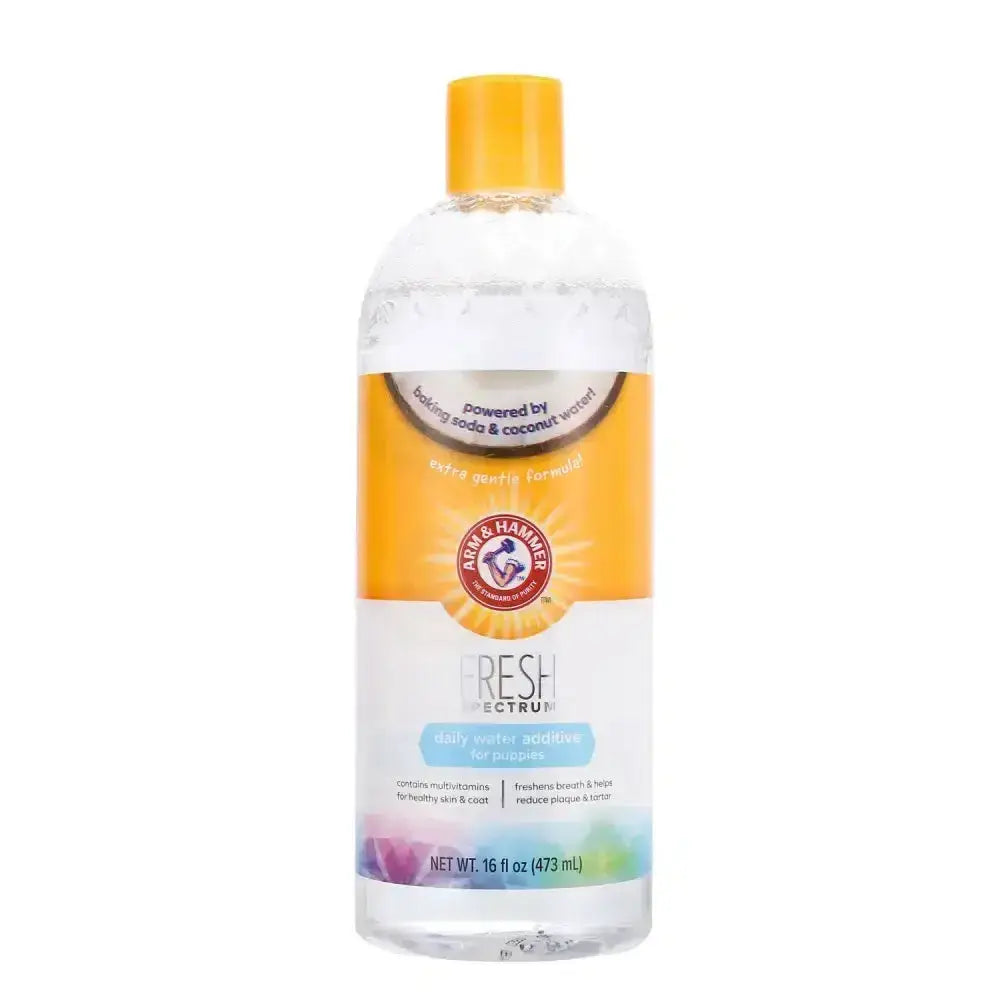 Clear plastic bottle with yellow cap and arm & hammer fresh ectrum fresh coconut water additive label