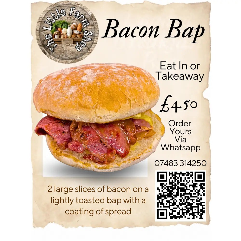 A golden-brown wheat flour bacon bap with two large slices of crispy bacon and a light spread