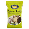 Bright green bag of badminton country cubes 20kg concentrated all-round ration for cattle sheep and goats