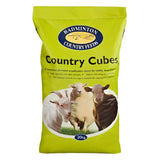 Bright green bag of badminton country cubes 20kg concentrated all-round ration for cattle sheep and goats