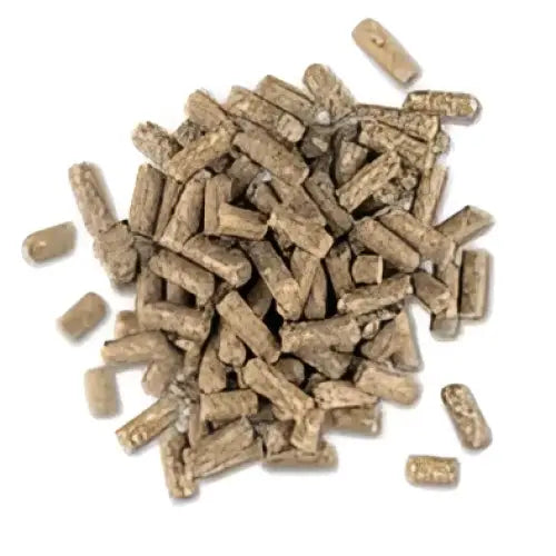 Brown cylindrical pellets of badminton country cubes animal feed or biomass fuel made from natural materials