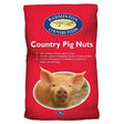 Red bag of badminton country pig fully balanced country pig nuts 20 kg with pig logo and white text on front