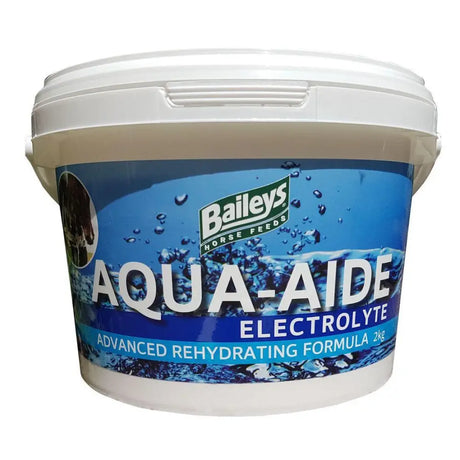 White plastic bucket with blue label of baileys aqua aide advanced electrolyte supplement 2kg for competition working horses
