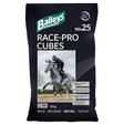 Black bag of baileys no 25 race pro cubes horse feed with green logo and jockey on grey racehorse oat-based racing feeds
