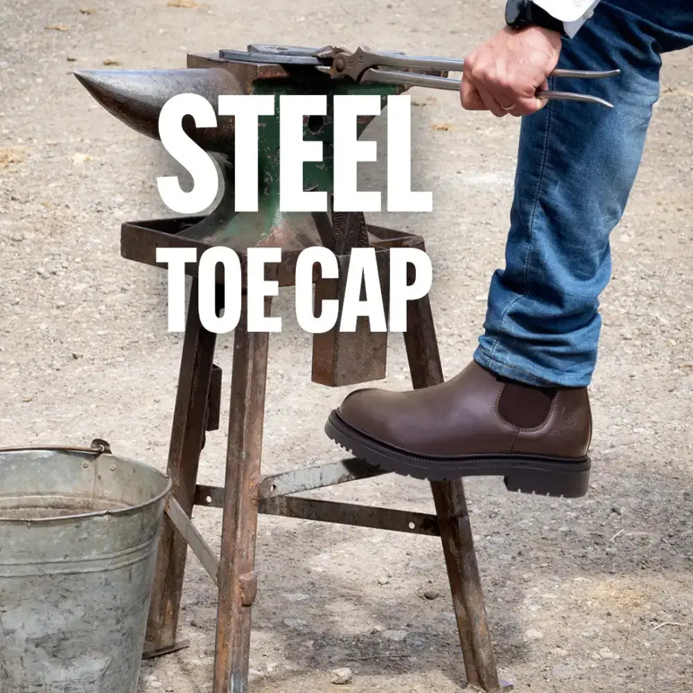 Brown leather bareback footwear detroit steel toe cap work boots being forged on anvil for durability
