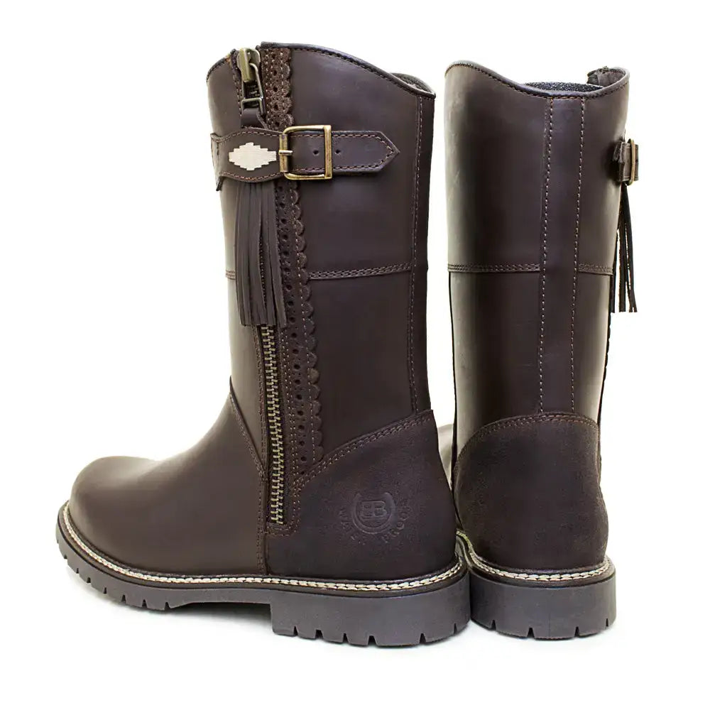 Dark brown hudson mid boots with gold buckle tassel detail featuring sheep wool insole and wil-tex membrane