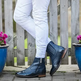 Dark blue patent leather ankle boots with zipper closure and slight heel from bareback footwear monroe blue short boot