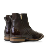 Dark brown croc-embossed leather ankle boots with glossy finish and tan vibram sole from bareback footwear monroe
