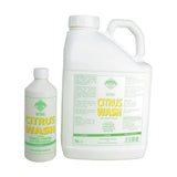 White plastic bottle of barrier citrus wash with green yellow label featuring pure concentrated citronella oil and aloe vera