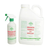 White plastic spray bottle with green trigger labeled barrier enhanced formula fly repellent with non-sting formulation