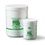 White plastic containers of barrier heel hoof soothing cream with green label to protect vulnerable areas naturally