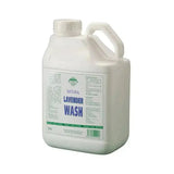 White plastic jug with handle and cap labeled barrier lavender wash natural lavender wash with high grade lavender no-rinse formula body