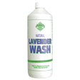 White plastic bottle of barrier lavender wash with green and purple label featuring no-rinse formula body wash and high grade lavender