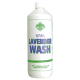 White plastic bottle of barrier lavender wash with green and purple label featuring no-rinse formula body wash and high grade lavender