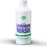 White plastic bottle of barrier lavender wash with purple and green labeling featuring high grade lavender no rinse formula body wash