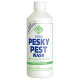 White plastic bottle of Barrier pesky pest wash with green-blue label and white cap non-rinse insect repellent wash