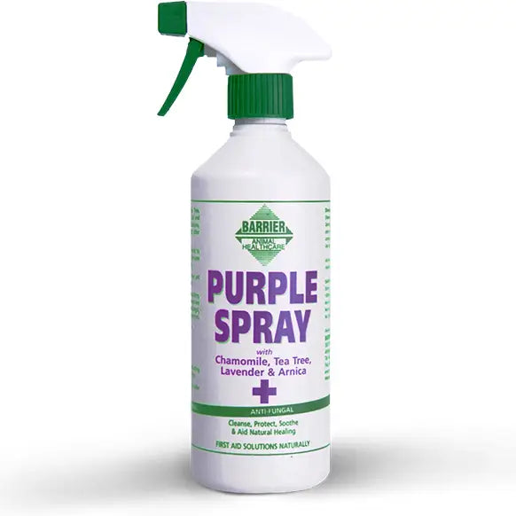White plastic spray bottle with green cap and trigger labeled barrier purple spray for superficial wounds in animal husbandry