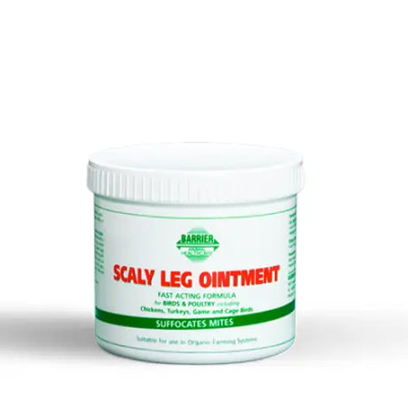 White plastic container of barrier scaly leg ointment with green and red label for treating scaly leg mite in birds