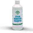 White plastic bottle of barrier stain remover shampoo with blue and green labeling for lustrous sheen provided