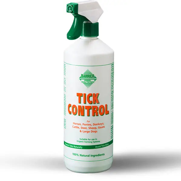 White plastic spray bottle with green trigger labeled barrier tick control for effective pest control use