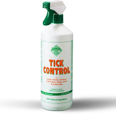 White plastic spray bottle with green trigger labeled barrier tick control for effective pest control use