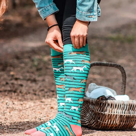 Teal and white striped funky welly socks ladies galloping horse with playful dog breed pattern knee-high design