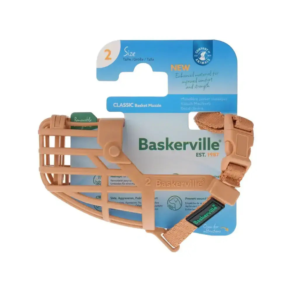 Tan baskerville classic basket muzzle for dogs made of durable improved thermoplastic rubber with secure adjustable strap