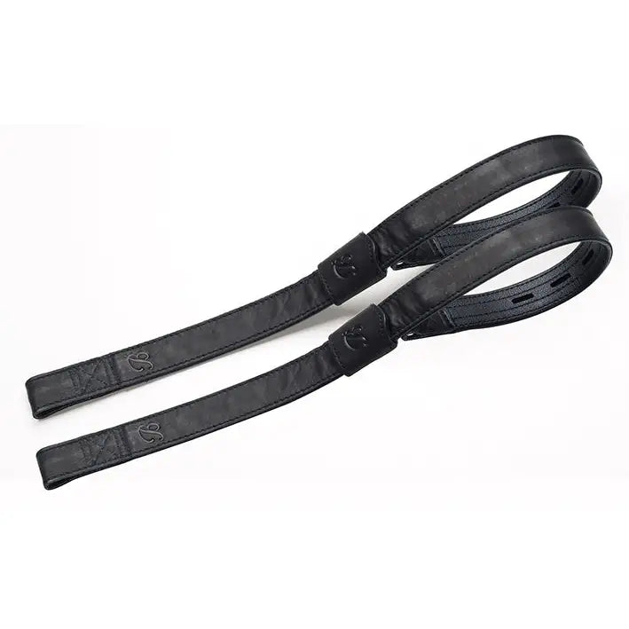 Black leather bates webbers strap with embossed logo and reinforced stitching for rider’s thigh support