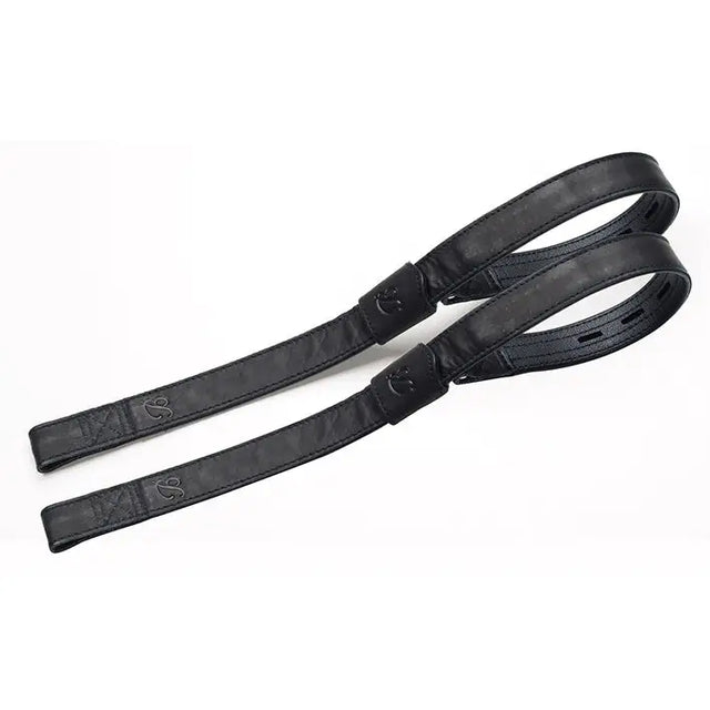 Black leather bates webbers strap with embossed logo and reinforced stitching for rider’s thigh support
