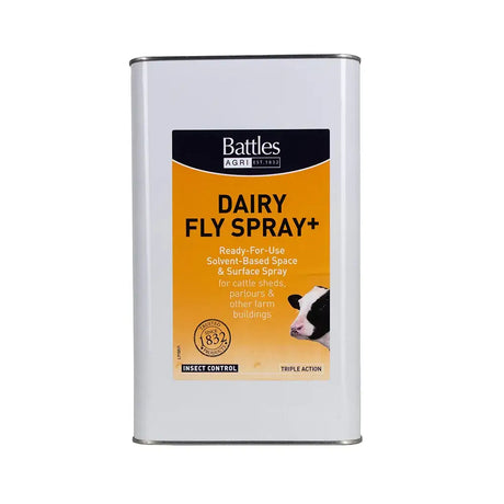 White metal can of battles dairy fly spray with orange and black label featuring a cow illustration