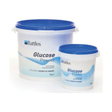 White plastic buckets with blue lids labeled battles glucose powder ideal for energy deficiency and glucose powder needs