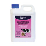 White plastic jug with blue cap and pink label showing cow and sheep for battles obstetrical lubricant use