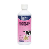 Pink plastic bottle of battles obstetrical lubricant with white cap and cow and sheep images on label