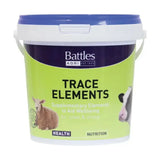 Battles trace element tablets in a white bucket with blue lid and green purple label for handy tablet form livestock health