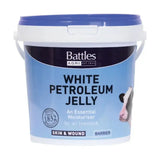 Battles white petroleum jelly in a blue white bucket with cow design essential moisturiser for livestock skin wounds