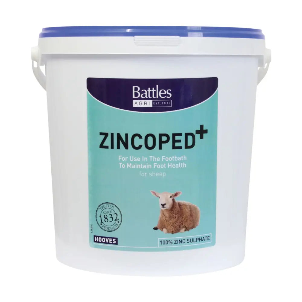 White plastic bucket with blue lid and teal battles zincoped label to maintain foot health in sheep