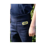 Navy blue knit brave tots jodhpurs by little knight with yellow embroidered patch and bulk elastic ankles