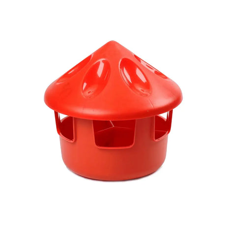 Red plastic mushroom shaped bec grit feeder station with multiple feeding slots and a divider for easy grit feeding