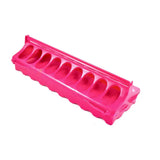 Bright pink plastic egg holder with ten oval compartments designed for bec linear feeder use