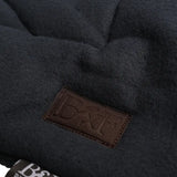 Dark gray quilted wool fleece dog bed with brown leather b&h logo patch benji & flo essential fleece dog bed
